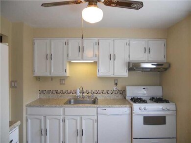 Kitchen. Light and bright.  All appliances stay, n