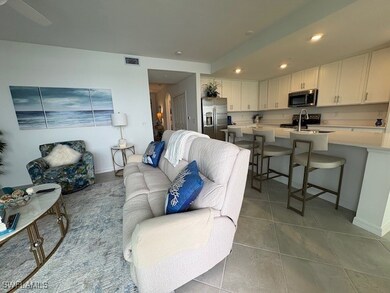 Decorated Great Room with Reclining Sofa and Swivel Chairs