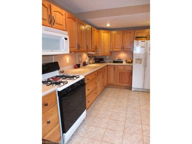 Spacious kitchen with ample counter space.