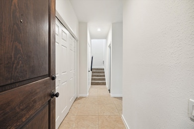 This photo shows the bright, clean entry hallway w