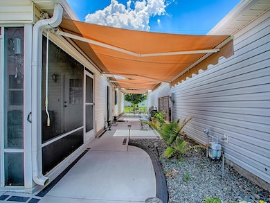 9324 SE 173rd Hyacinth St, The Villages, FL 32162 - photo 5