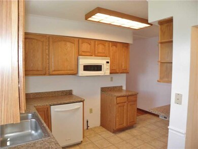 Kitchen. Spacious L-Shaped Kitchen recently Update