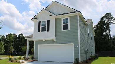 Craftsman inspired home with a garage and central 