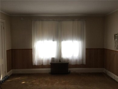 Living room with a doorway to the...