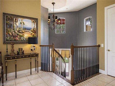 Grand Foyer Entry with Winding Stairway