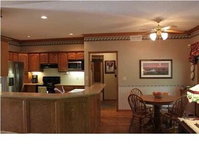 Impressive kitchen is bright & open!