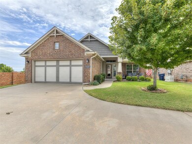 View of front of property featuring a garage and a