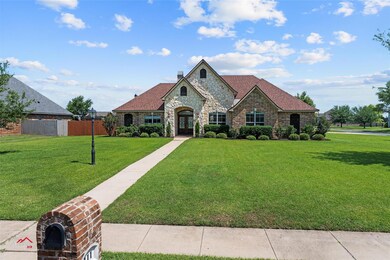 Home is located on a corner lot with a large front