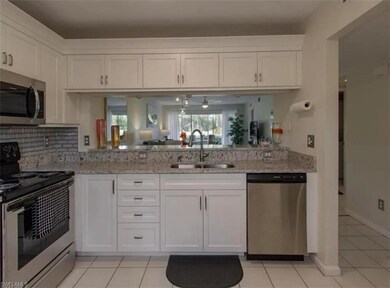 Kitchen featuring granite counters and lots of sto