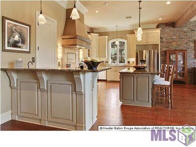 Kitchen has stainless appliances, oven, built-in m