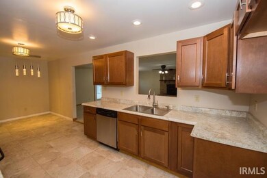 Beautiful kitchen has stainless steel appliances a