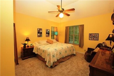 Master bedroom is upstairs and has a vaulted ceili