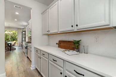 Interior space with recessed lighting, visible ven