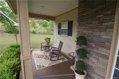 The front porch welcomes your friends and family.