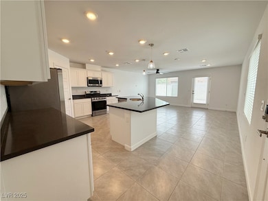 Kitchen with appliances with stainless steel finis