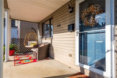 Cozy front porch with fresh front door paint color