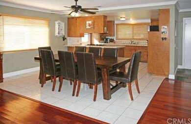 Large Dining Area with Tile Flooring & Ceiling Fan