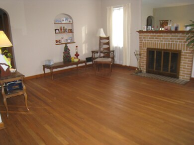 Living Room w/ log burning fireplace