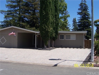 Ample parking with garage, carport, and plenty of 