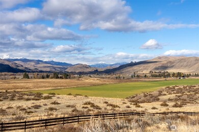 The ranch includes irrigated hay fields with dedicated water rights, currently leased to a local hay farmer.