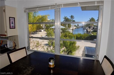 UPPER LEFT UNIT:  CANAL VIEW FROM KITCHEN WINDOWS