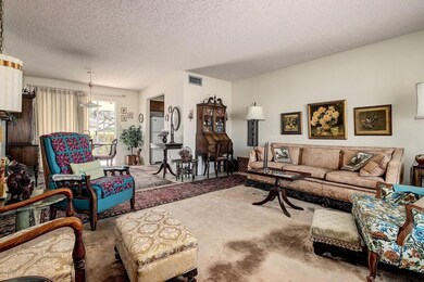 Living Room Opens to Dining Area