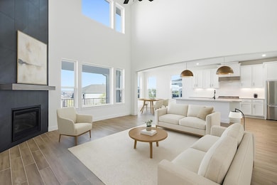 Living room with light wood-type flooring, a tile