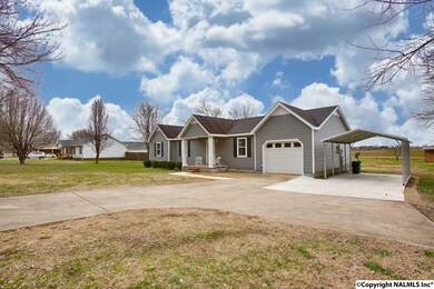 Plenty of parking including single-car garage and single-car carport.