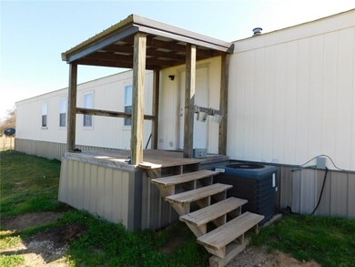 Small covered back porch.