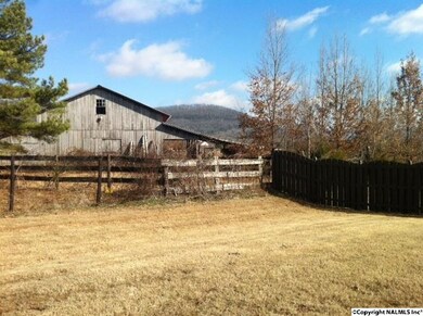 Generous Back Yard overlooks mountains, pasture and this quaint barn.