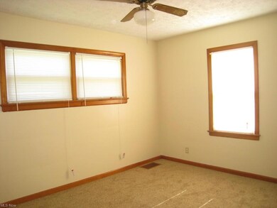 Bedroom 2 is located on the main floor and is of s