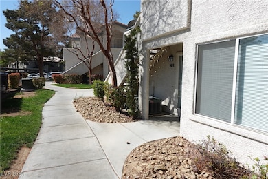 Property entrance featuring stucco siding and cent