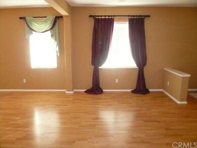 Dining room with hardwood floors.