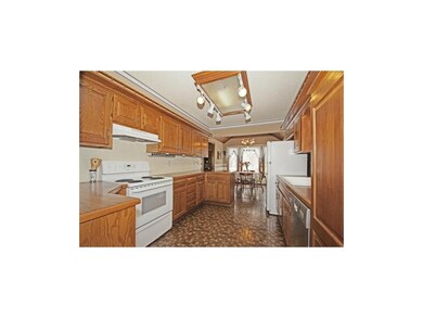 Large kitchen with pantry and loads of cabinets is