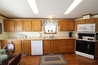 Large eat-in kitchen with new flooring!