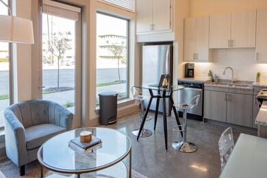 Kitchen featuring backsplash, sink, stainless stee