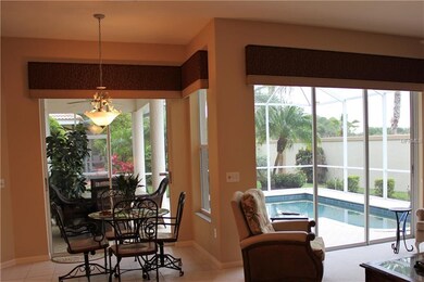 Family area & dinette area with shades open.......