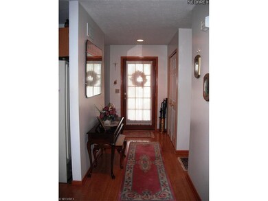 Foyer entry with wood look laminate floor