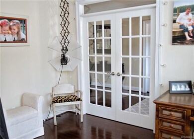 Front office with French doors, crown moulding and