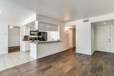 View of the kitchen from the living area.