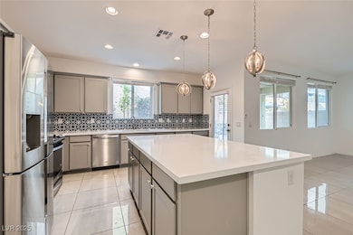 Kitchen with appliances with stainless steel finis