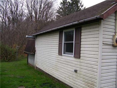 Garage. side view of garage.  Has electric.