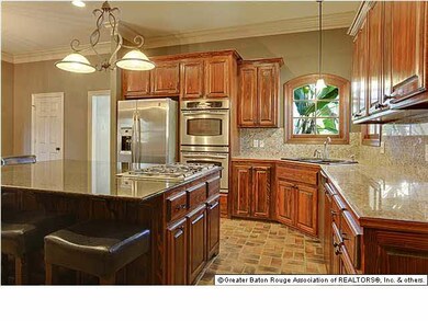 Door to the left is the dining room with bay window, other door to the left is the half bath.