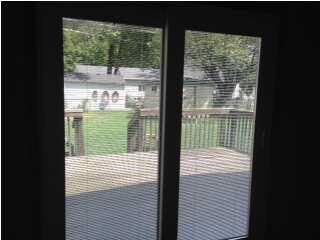 Newer sliding Glass door with Built-in Shades, wal