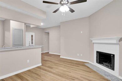 Unfurnished living room with light wood-style floo