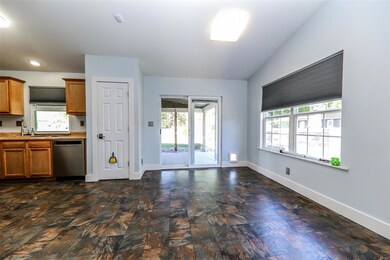 So much light with plenty of windows and sliding doors.