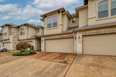 Townhome / multi-family property featuring stucco