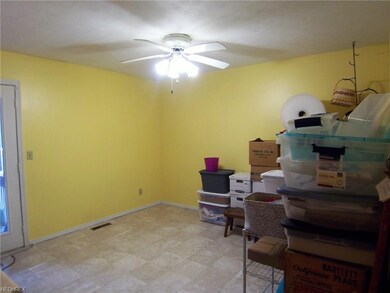 Dining Area with access to enclosed porch.
