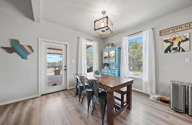 Dining room featuring light wood-type flooring an