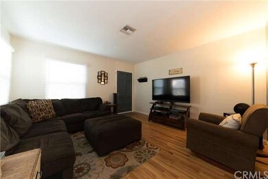 Living room and notice the hardwood floors through
